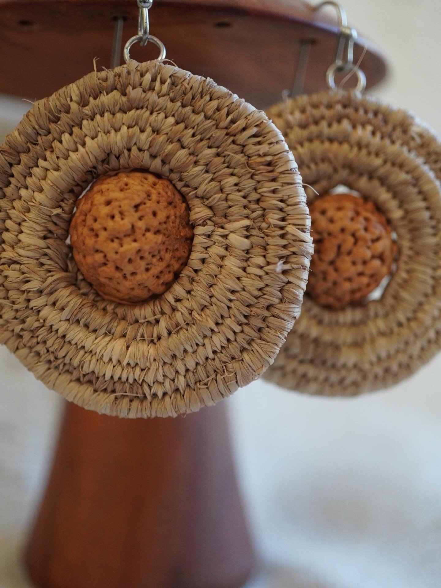 Gorgeous quandong centre earrings with iron and tannin dyed raffia
