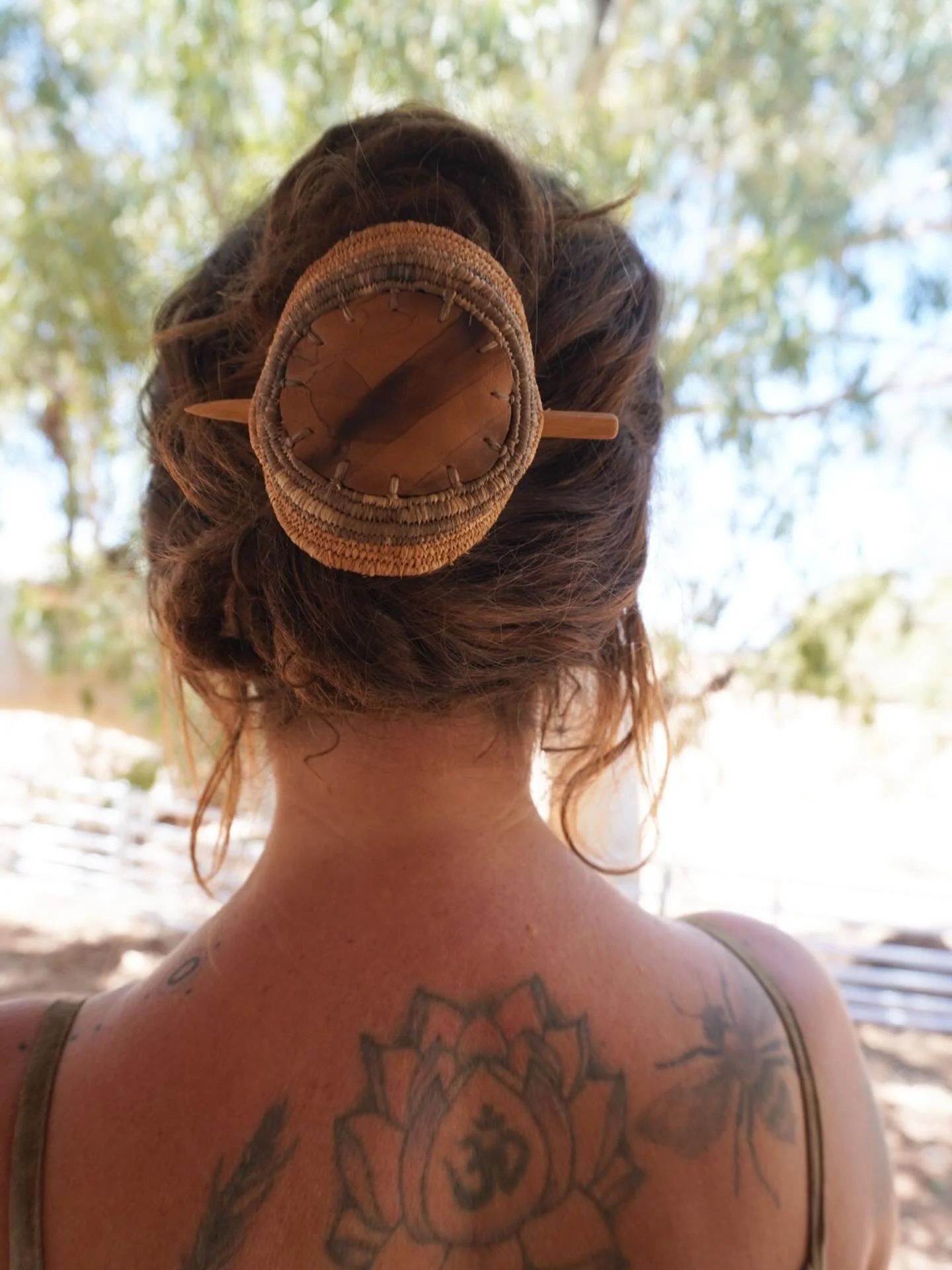 Iron Leaf prints on leather. Iron and onion skin dyed raffia.