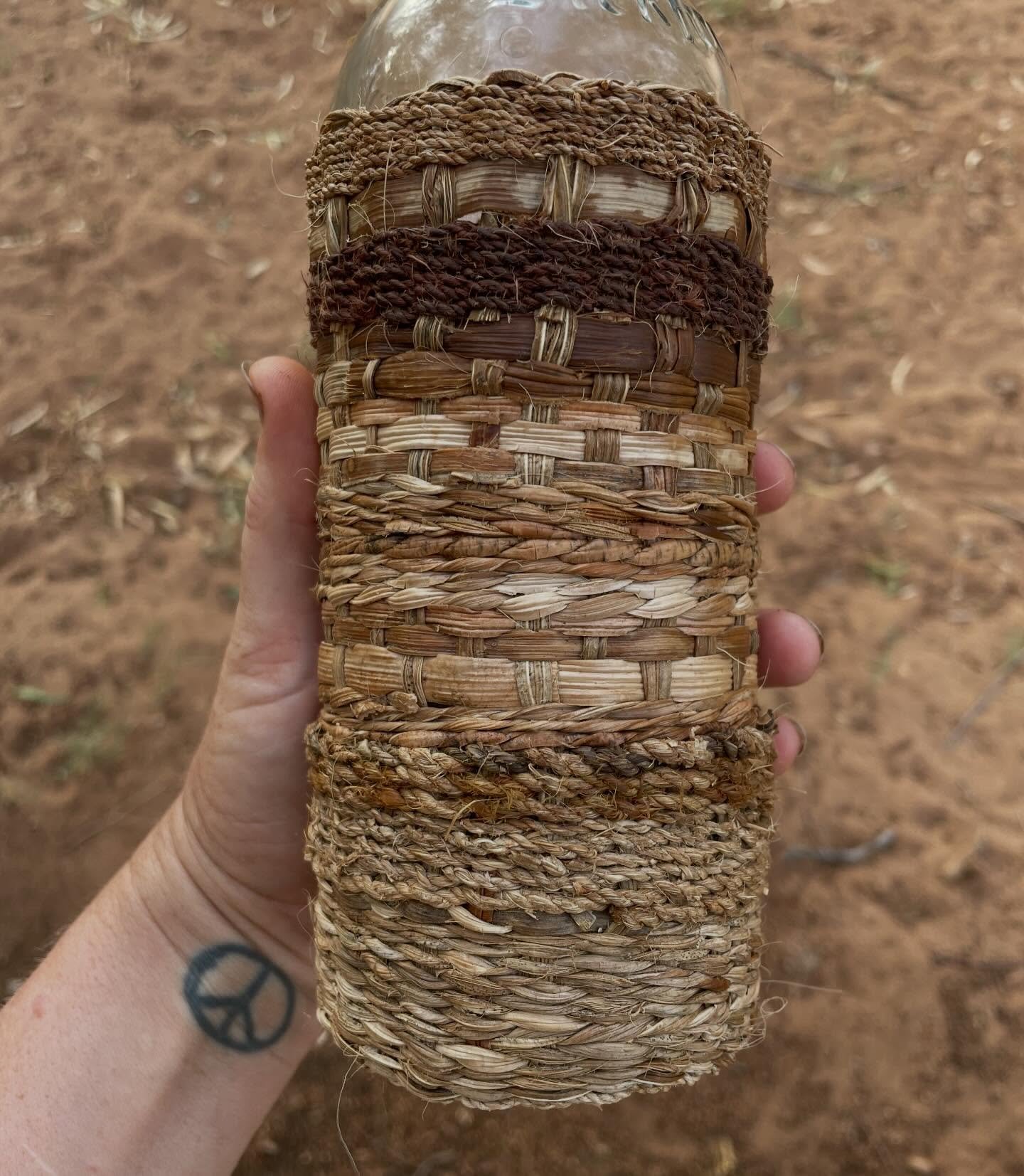 I&rsquo;m always worried about my glass bottles breaking. 
When buying honey the other day I saw some gorgeous palm sheaths.
I smuggled them into the car and brought them home. 
Using some of the cordage I have made I wove a nice little sock. 
It&rsq