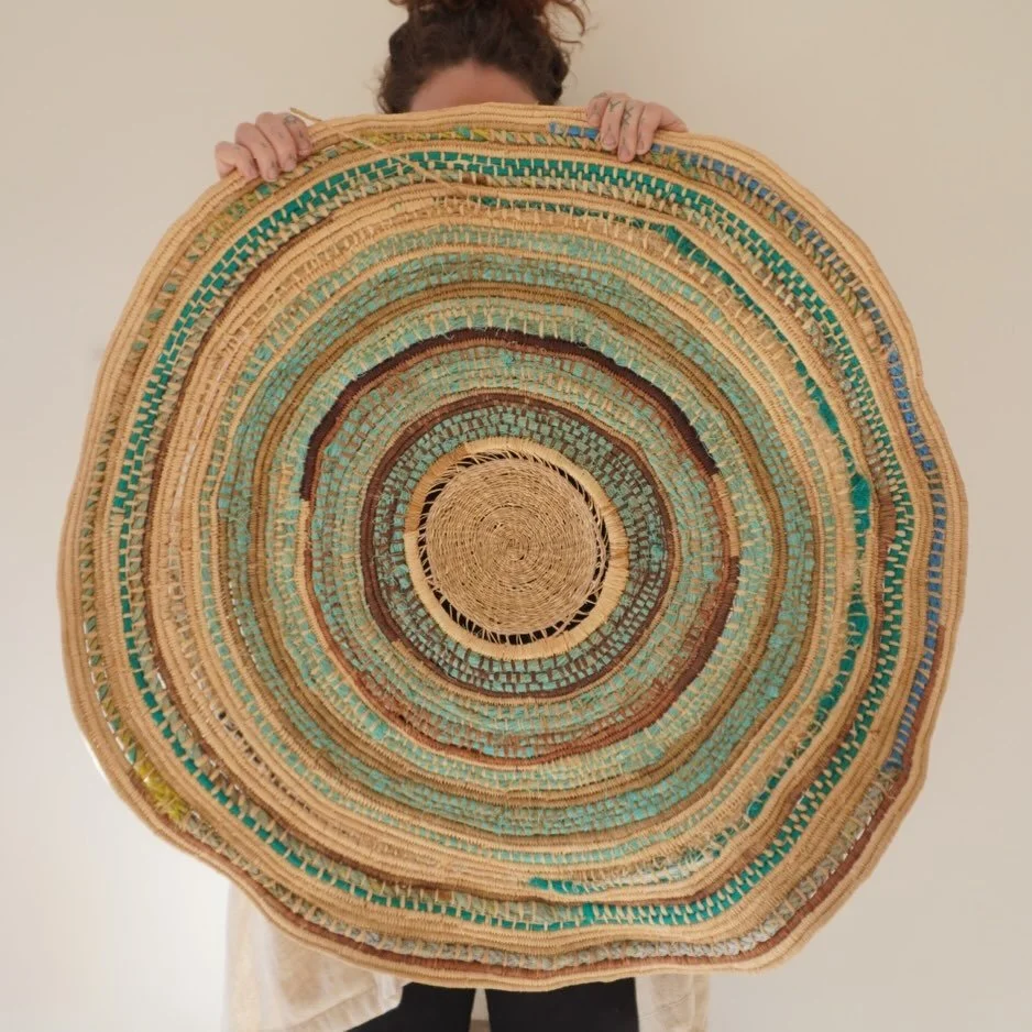 A piece I spoke of earlier, created from washed up ropes and raffia. The centre twinned NZ flax. It was going to be a basket then I realised it would take forever so I wove around it. 
It sat for awhile until inspiration hit. 
This piece took many mo