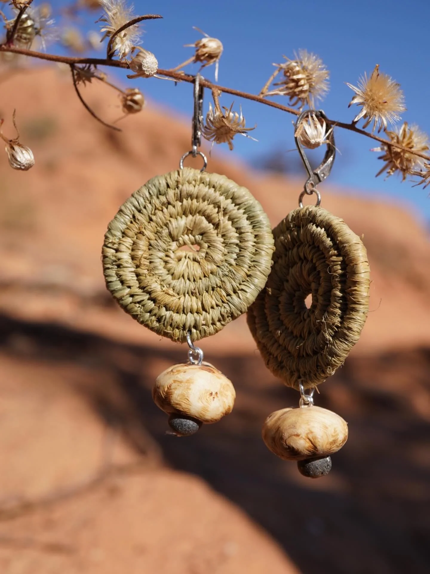 Indigo dyed raffia with little gall beads and Baltic amber.
I love this combo. 
The galls are little balls created when a parasite goes into the wood and lays eggs. The branch/wood grows around it. Eventually the eggs hatch and go into the world, the