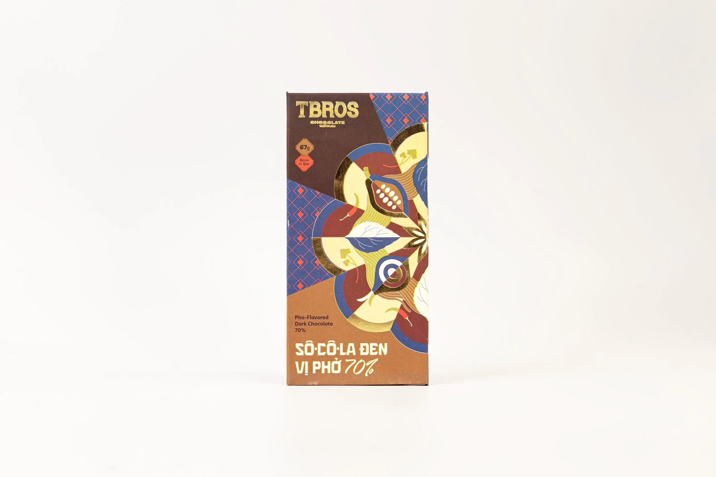 A package of TBROS dark chocolate with colorful abstract design on the front, indicating 70% cocoa content.