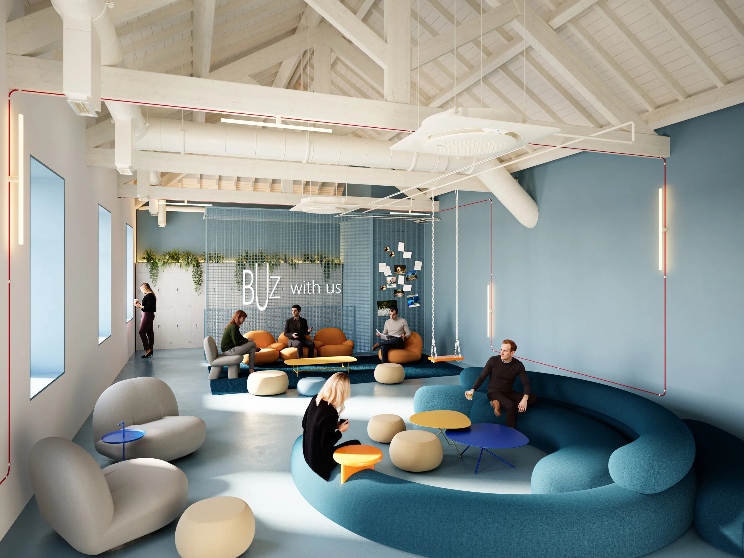 Modern coworking space with blue and gray walls, white ceiling beams, and large windows. There are various seating areas with colorful furniture, including a circular blue sofa, beige and gray chairs, and small tables. People are seated and working o
