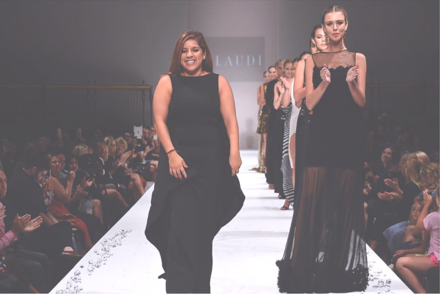 Johana takes a bow after her runway show