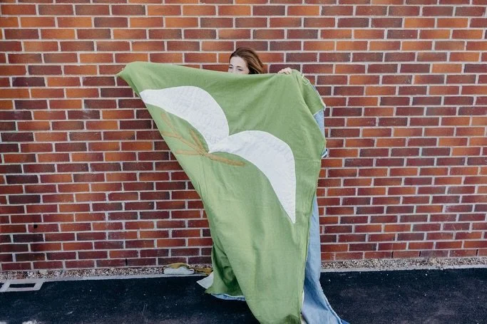 A personal project 🕊️ making a quilt for my son who we named Jonah Levi after the symbolic Dove who arrives after turbulent times holding an olive branch. 🍃 
I am quilting it entirely by hand using old vintage threads. The fabrics it is made from a