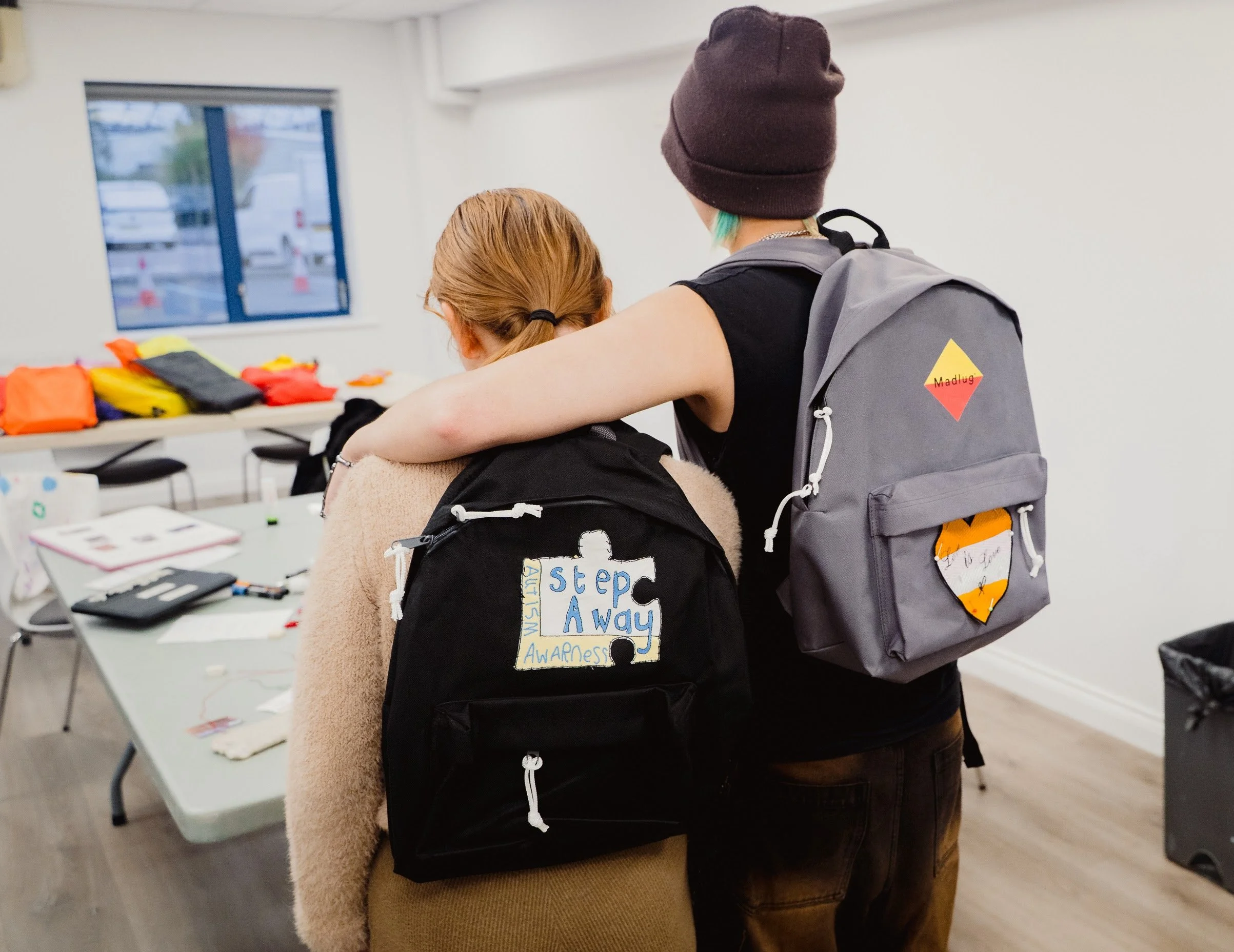 Madlug project with looked after children making digital embroidered badges