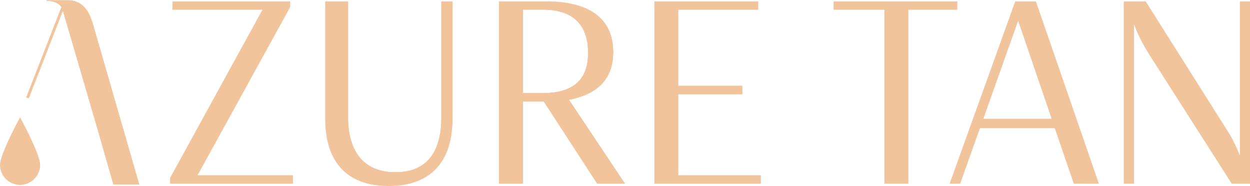 Close-up of a sign with the text 'AZURE TAN' in large, beige letters on a black background.