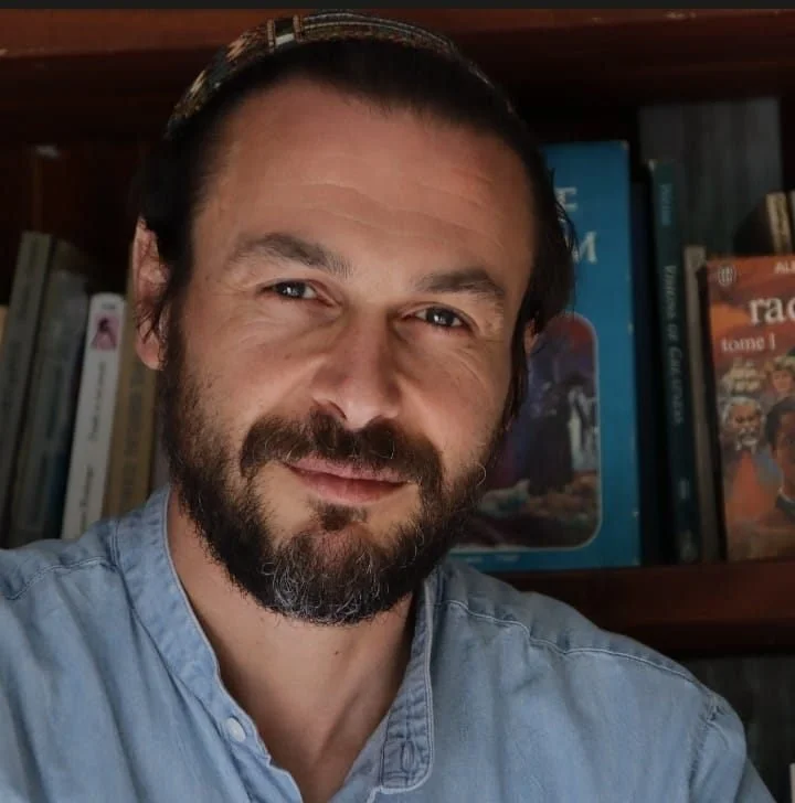 woman on white dress, dancing, smiling, in a natural environment