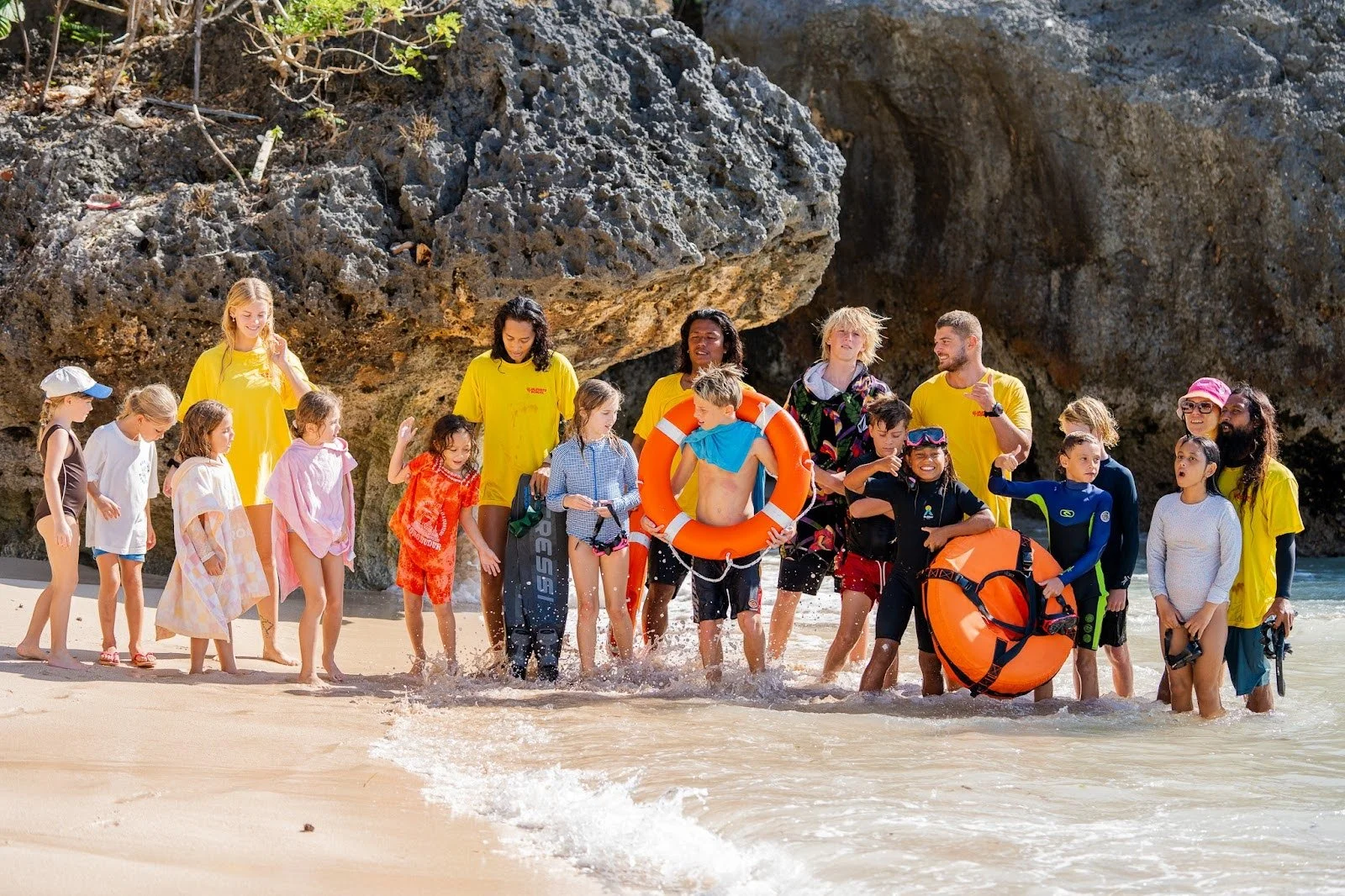 Uluwatu School students and teachers participating in ocean and beach learning activities in Bali