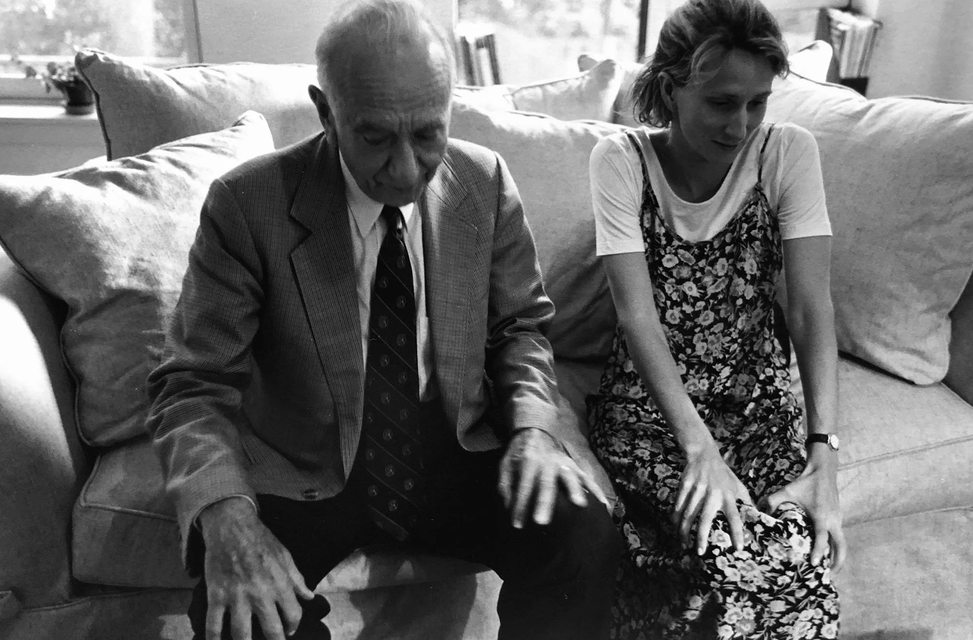 Untitled (Two People Sitting on Couch)