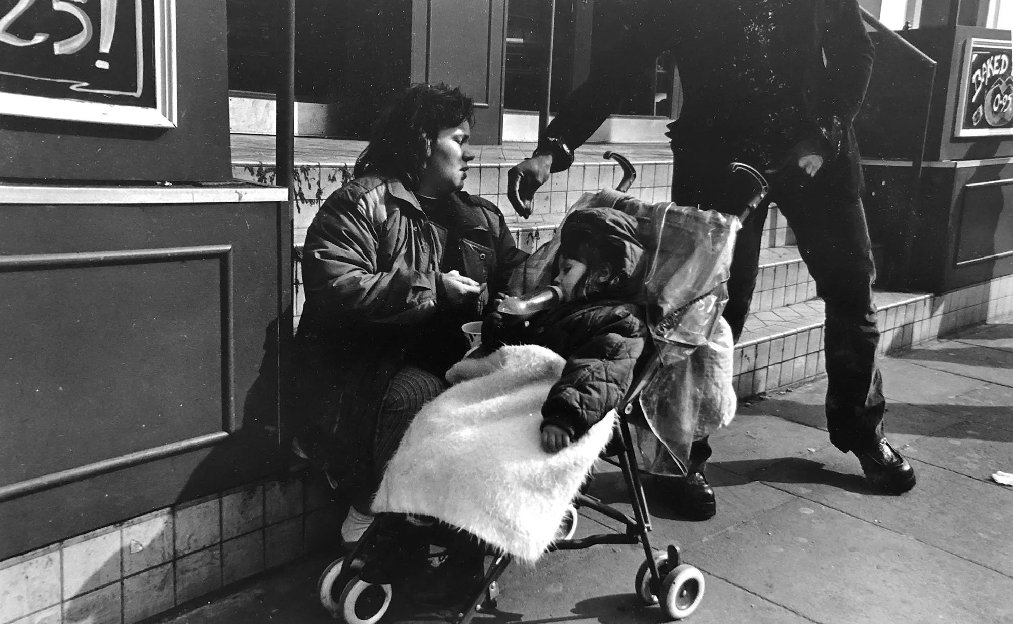 Untitled (Homeless Woman and Kid)