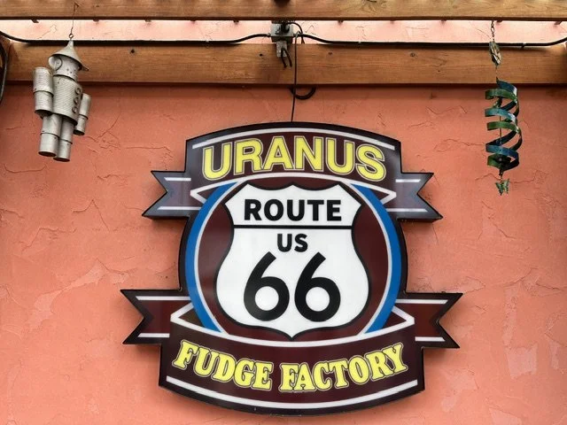 Uranus Fudge Factory sign along Historic US Route 66 in Missouri, welcoming travelers to the quirky roadside attraction known for homemade fudge and playful humor.