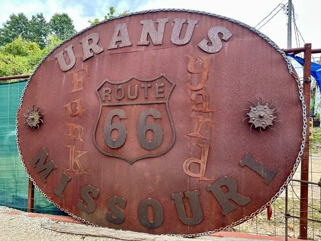 The World's Largest Belt Buckle on display at Uranus Fudge Factory near St. Robert, Missouri. This oversized roadside attraction is a popular Route 66 landmark and photo stop for travelers exploring central Missouri.