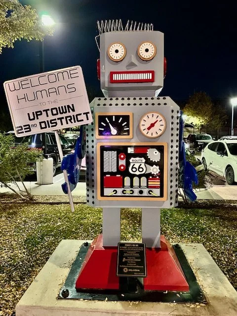 Robot sculptures along historic Route 66 in Oklahoma City, a fun roadside stop for electric vehicle travelers planning scenic EV road trips across Oklahoma.