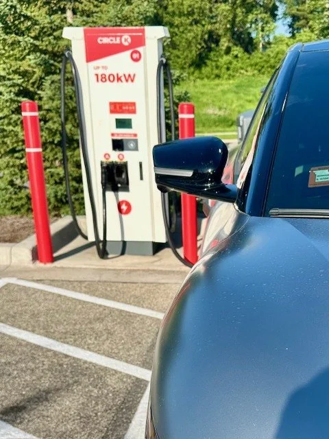 Our gray Kia EV6 tops off its battery at the Circle K on Assisi Drive NW in Rochester before heading south toward Harmony and Niagara Cave.