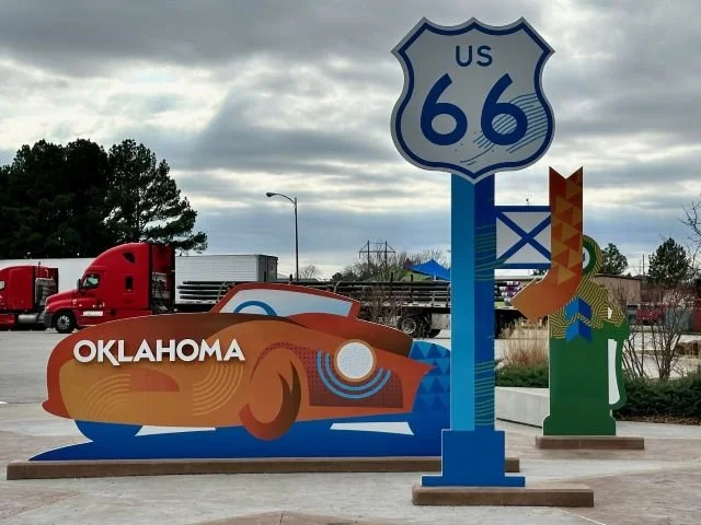 Oklahoma highway rest stop displaying Route 66 signs along historic US Route 66.