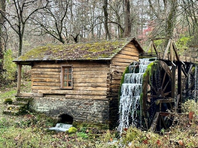 Historic Reed Spring Mill in Centerville, Missouri surrounded by scenic Ozark landscape