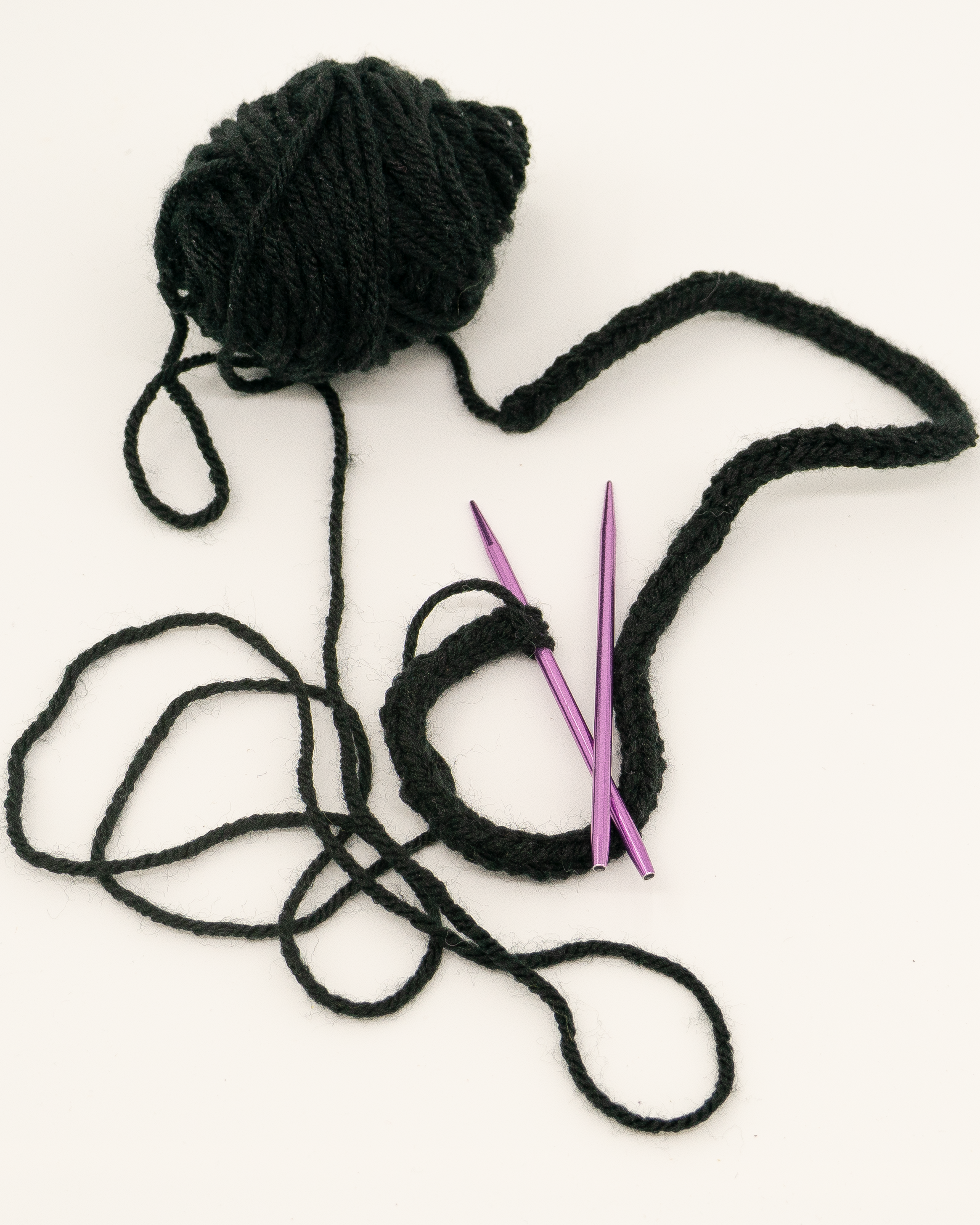 Knitted cord to add to leg warmers.