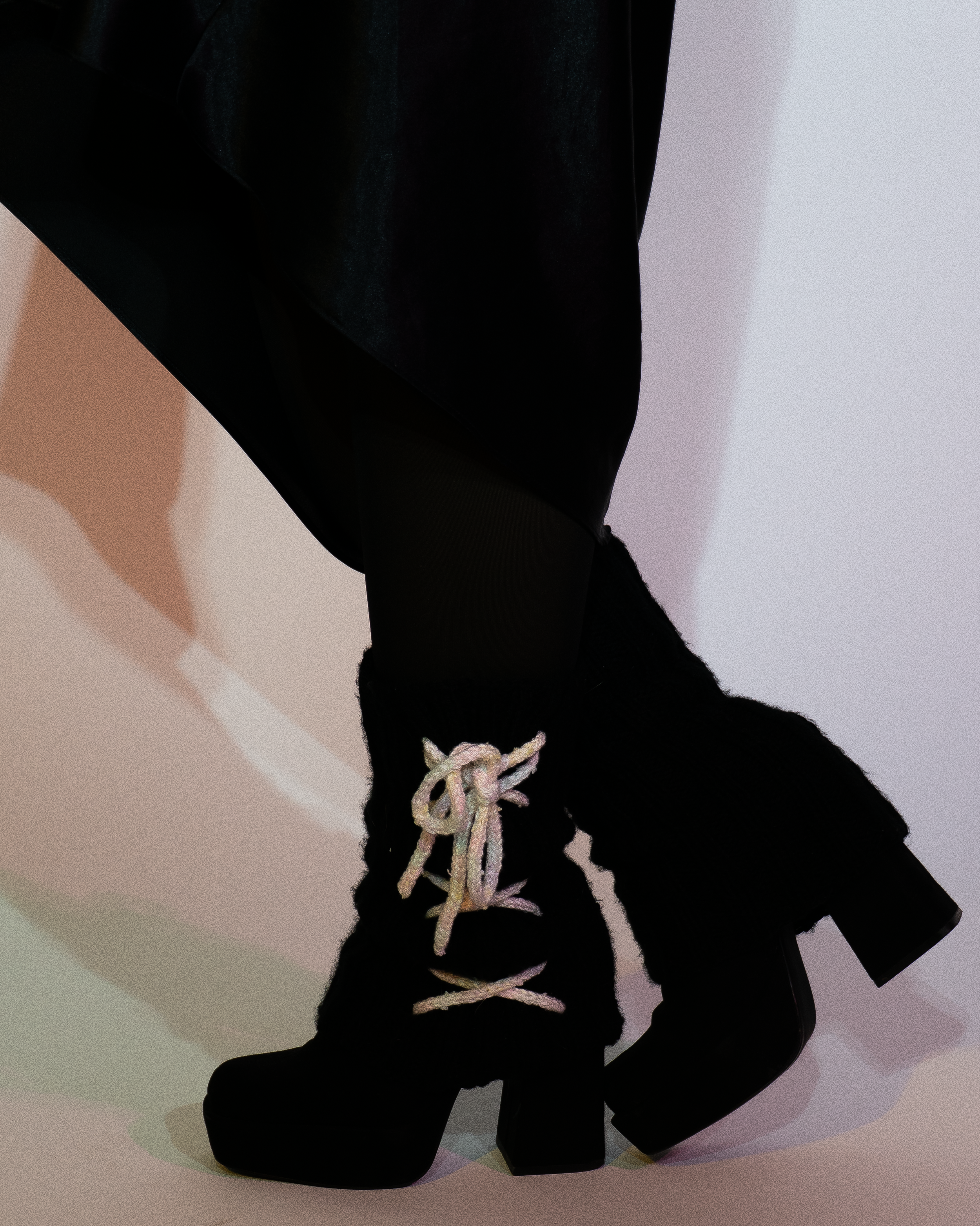 Knitted leg warmers and knitted lace.