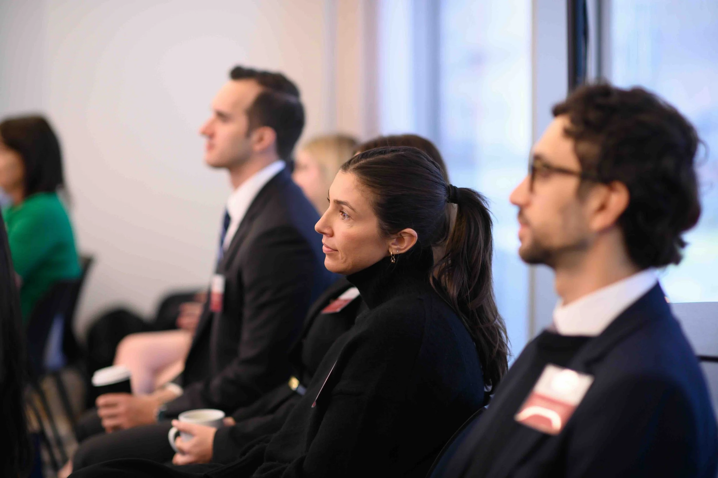 Attendees seated and listening during a session at the Hines symposium
