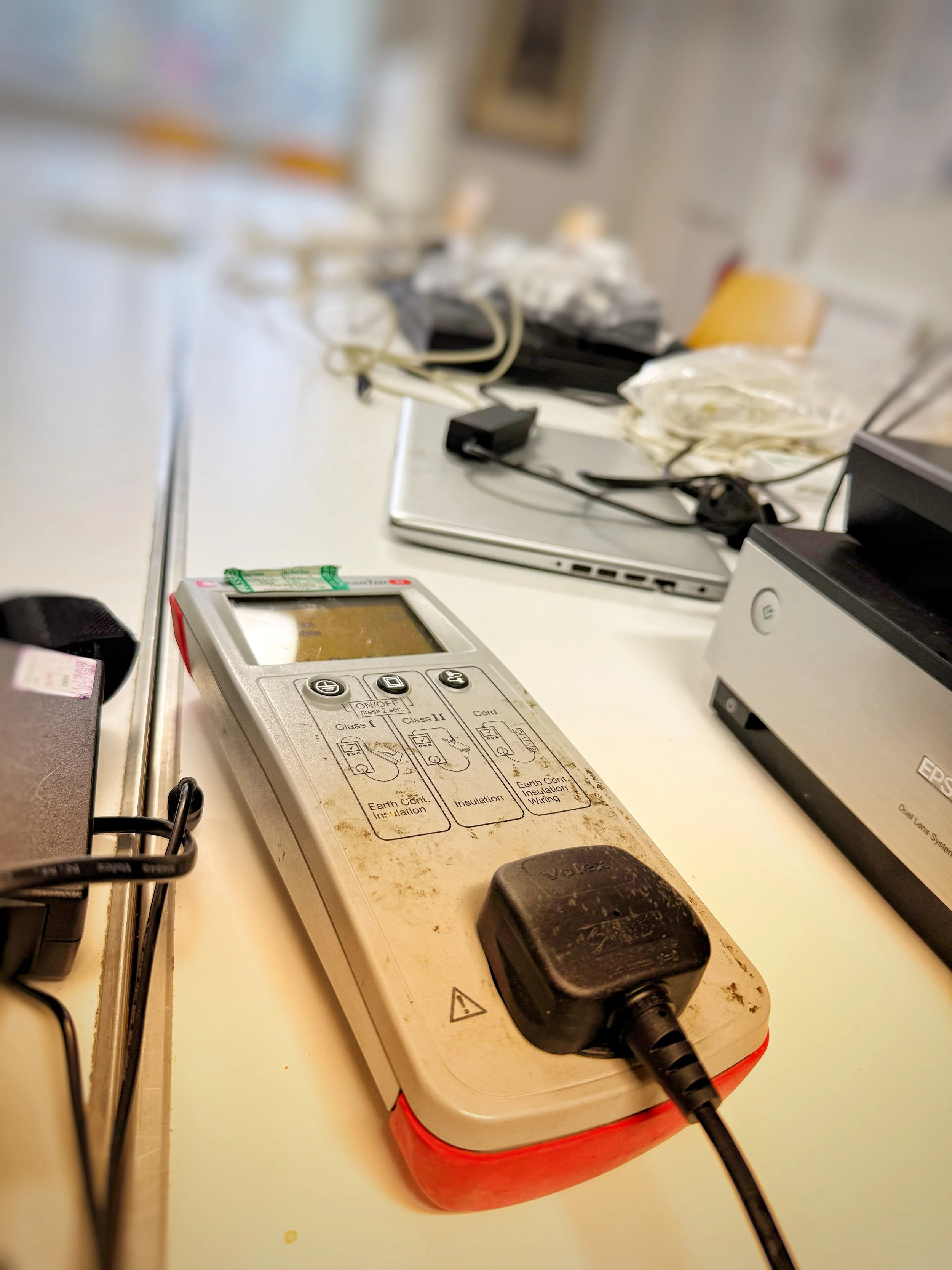 PAT testing labels and inspection stickers prepared for application to electrical equipment at Brenchley Memorial Hall meeting room