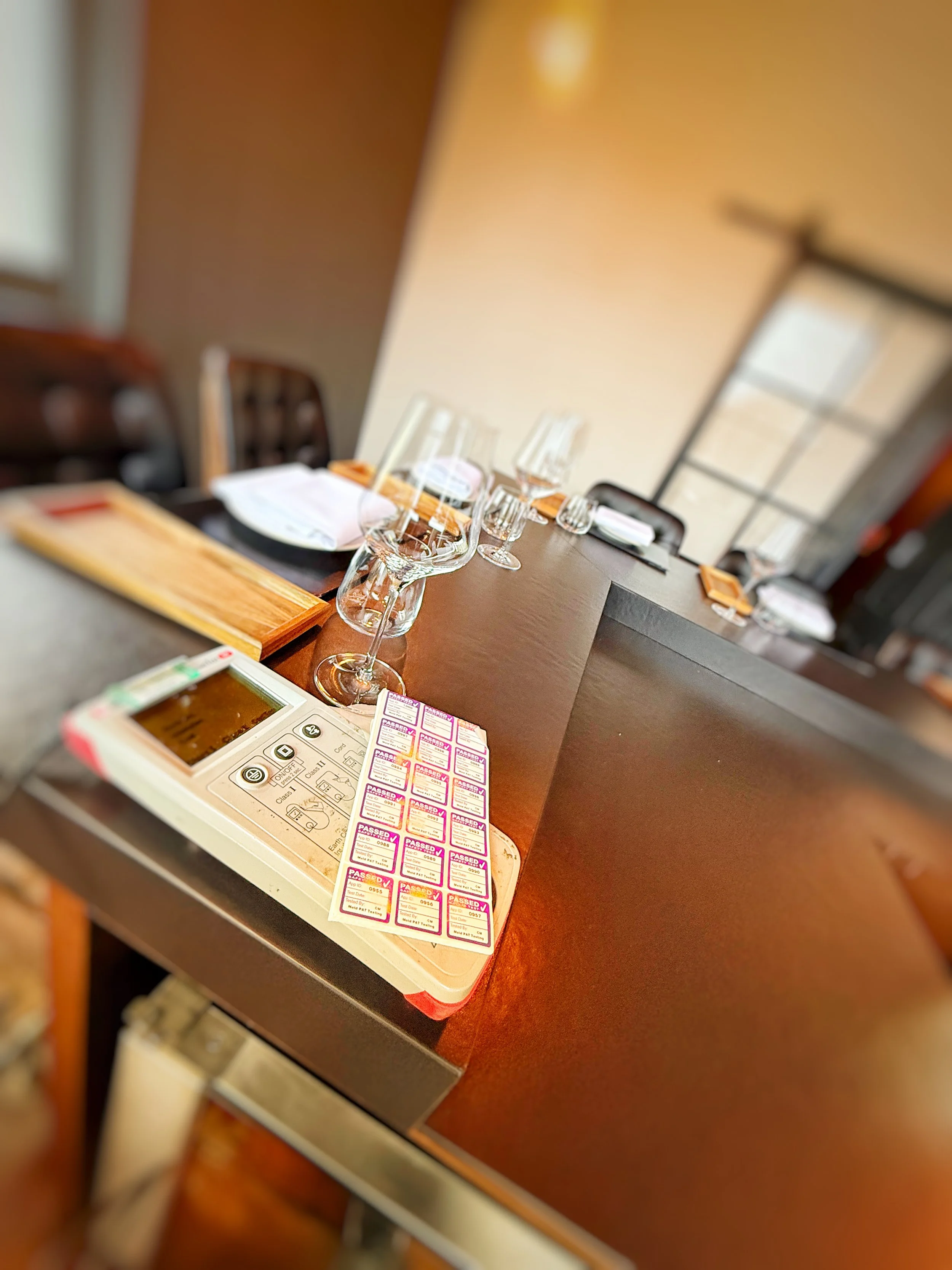 PAT testing equipment set up on the chef’s table at Tallow restaurant in Southborough during a professional portable appliance testing inspection