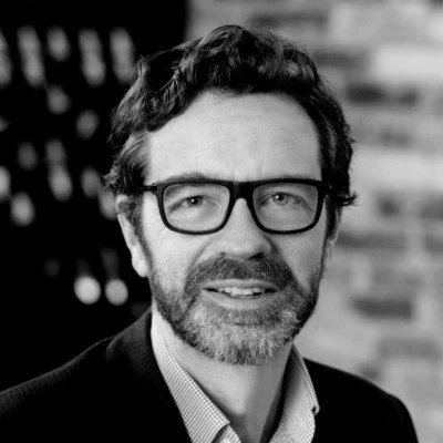 Portrait of Dr Matthew Vickers, CEO of Community Energy England and advisor at Windfall Energy.