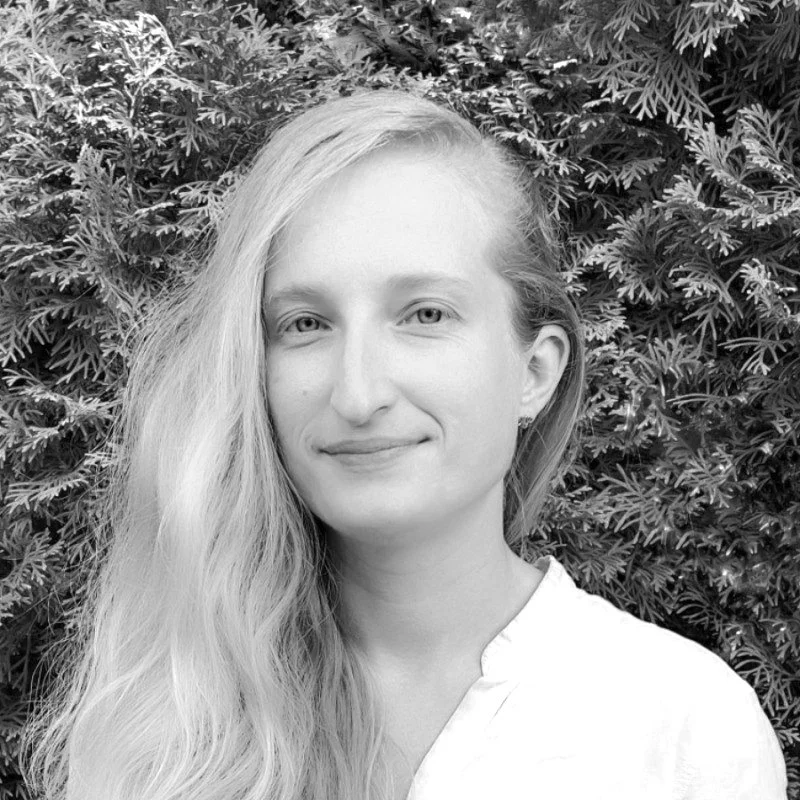 Black and white portrait photograph of Isabel Spigarolo, Operations Specialist / Founders' Associate at Windfall Energy.