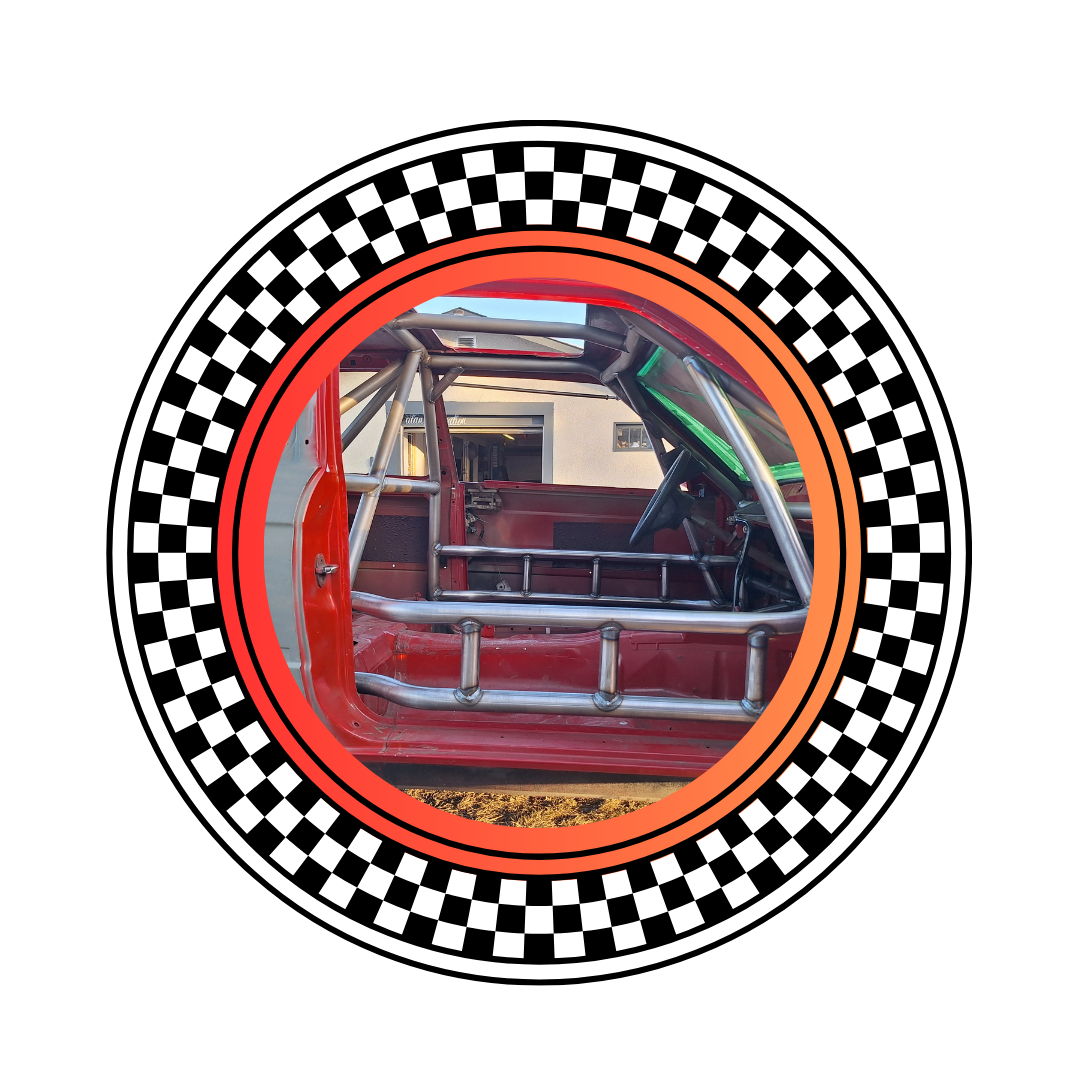 Close-up view of the interior of a race car with a steel roll cage and red body, viewed through a circular frame with a checkered pattern.