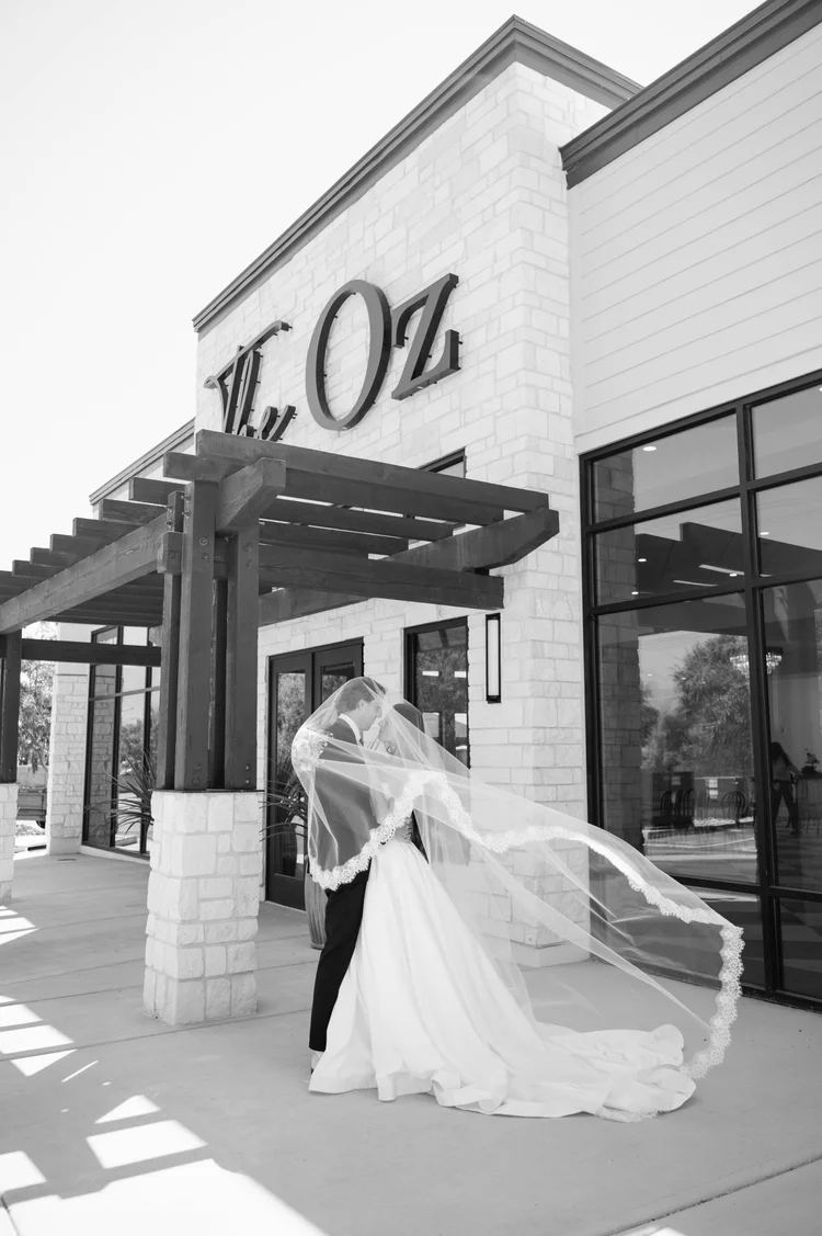 A timeless wedding portrait outside The Oz