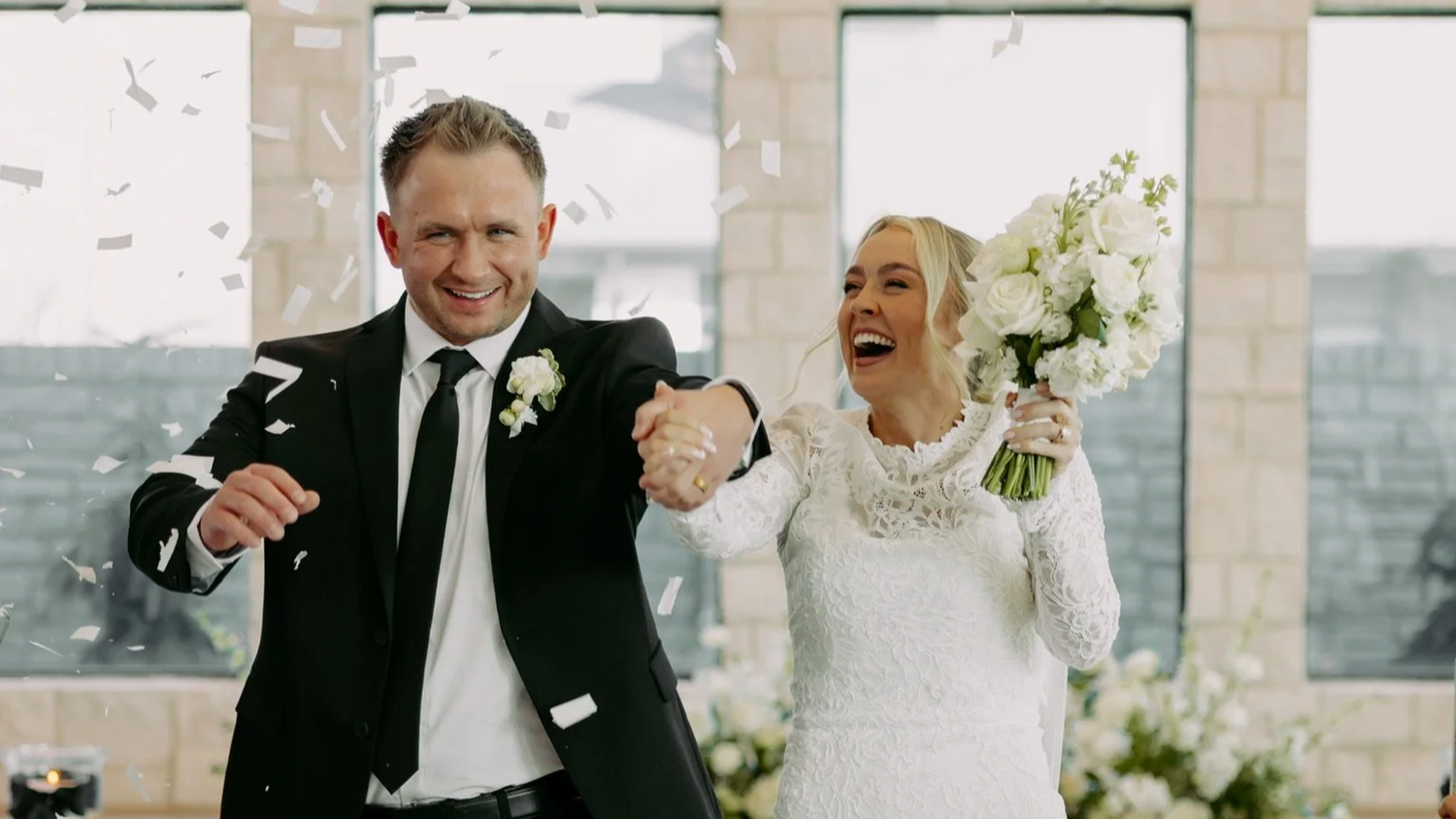 Kenzie and Ben celebrating their wedding at The Oz