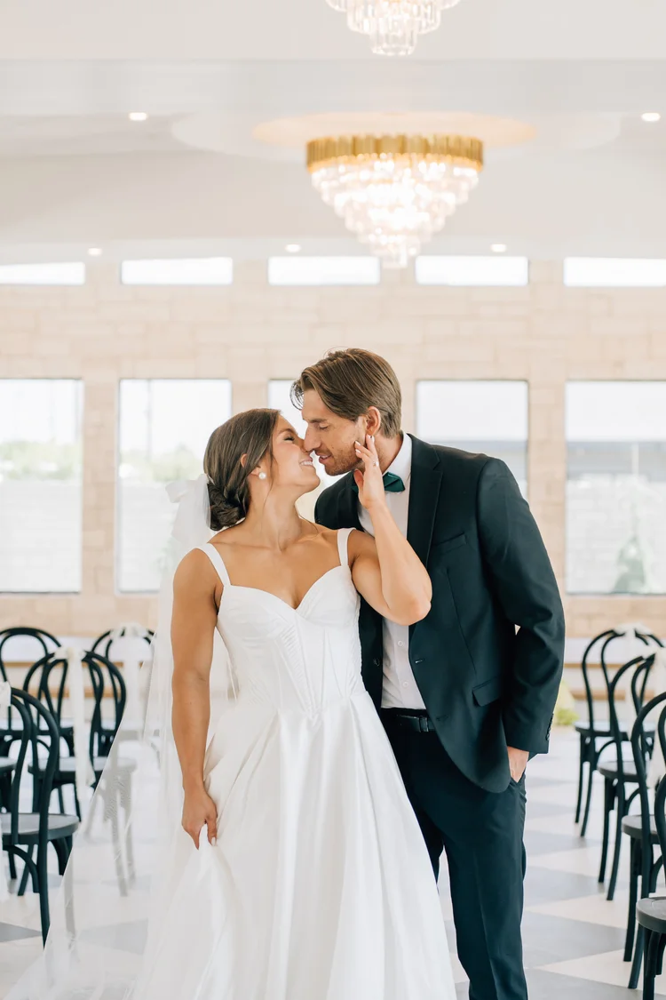 A joyful couple celebrates at The Oz