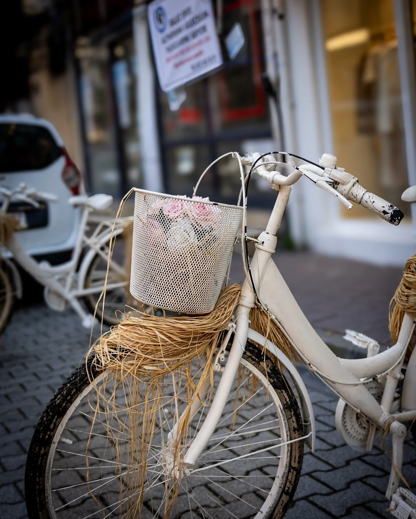 A still moment in motionless wheels

#StreetPhotography #UrbanPoetry #VisualStorytelling #StreetAesthetic #RomanticStreetStyle #StillLifeInTheCity #BikeStories #DecorativeBike #StreetCharm #CityDreamscape #PastelVibes #NostalgicVibes #PoeticStreets #
