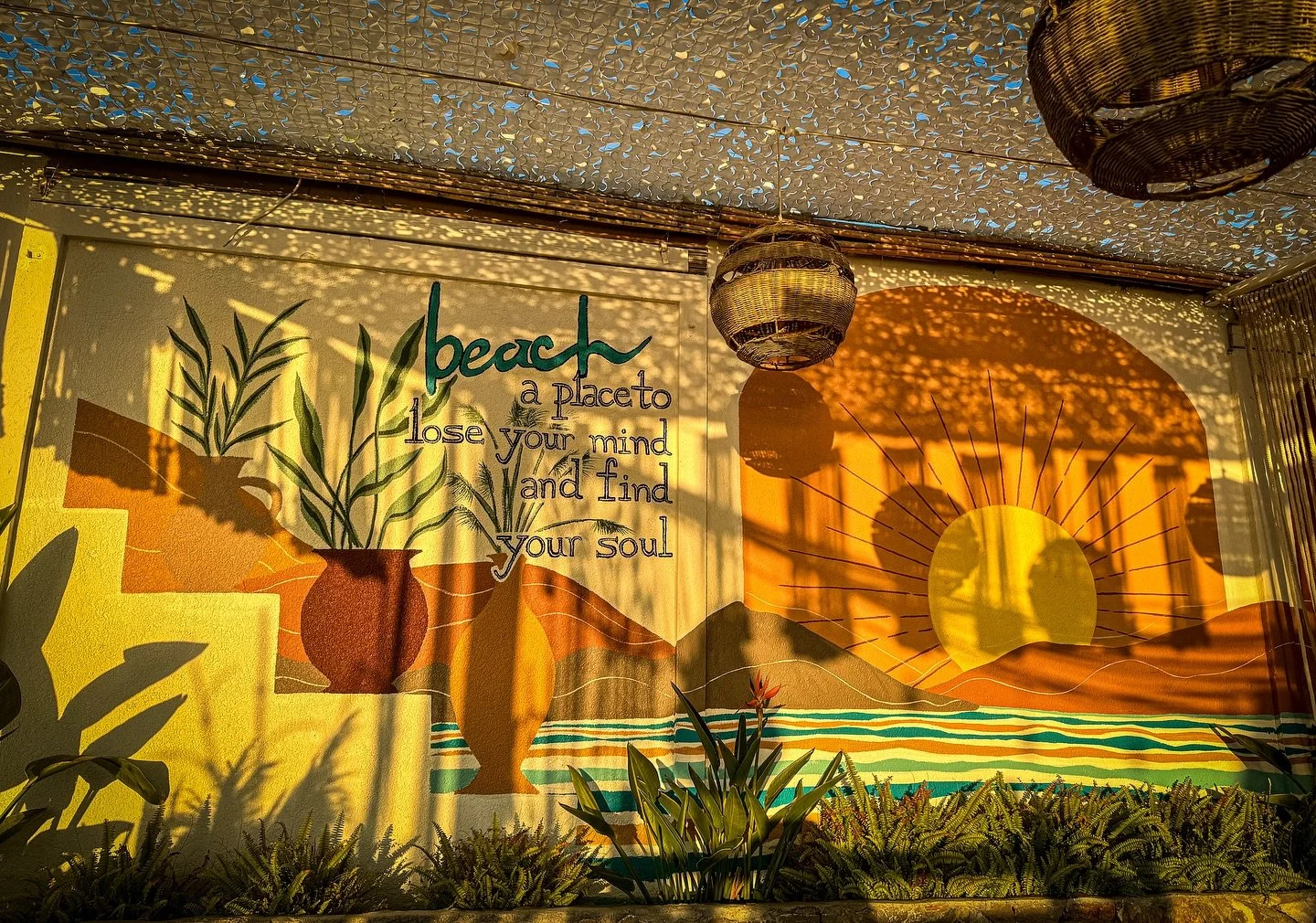 The place to lose your mind and find your soul.

#GoldenHourMagic #BeachVibes #SoulfulSpaces #MindfulTravel #BohoAesthetic #SunsetMood #WanderWithPurpose #EscapeTheOrdinary #DesignInspo #BeachCafeVibes #WallArtDaily #MuralsOfInstagram #SeasideEscape 