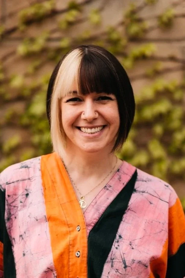 Professional headshot of our education coordinator, Caleigh Smith