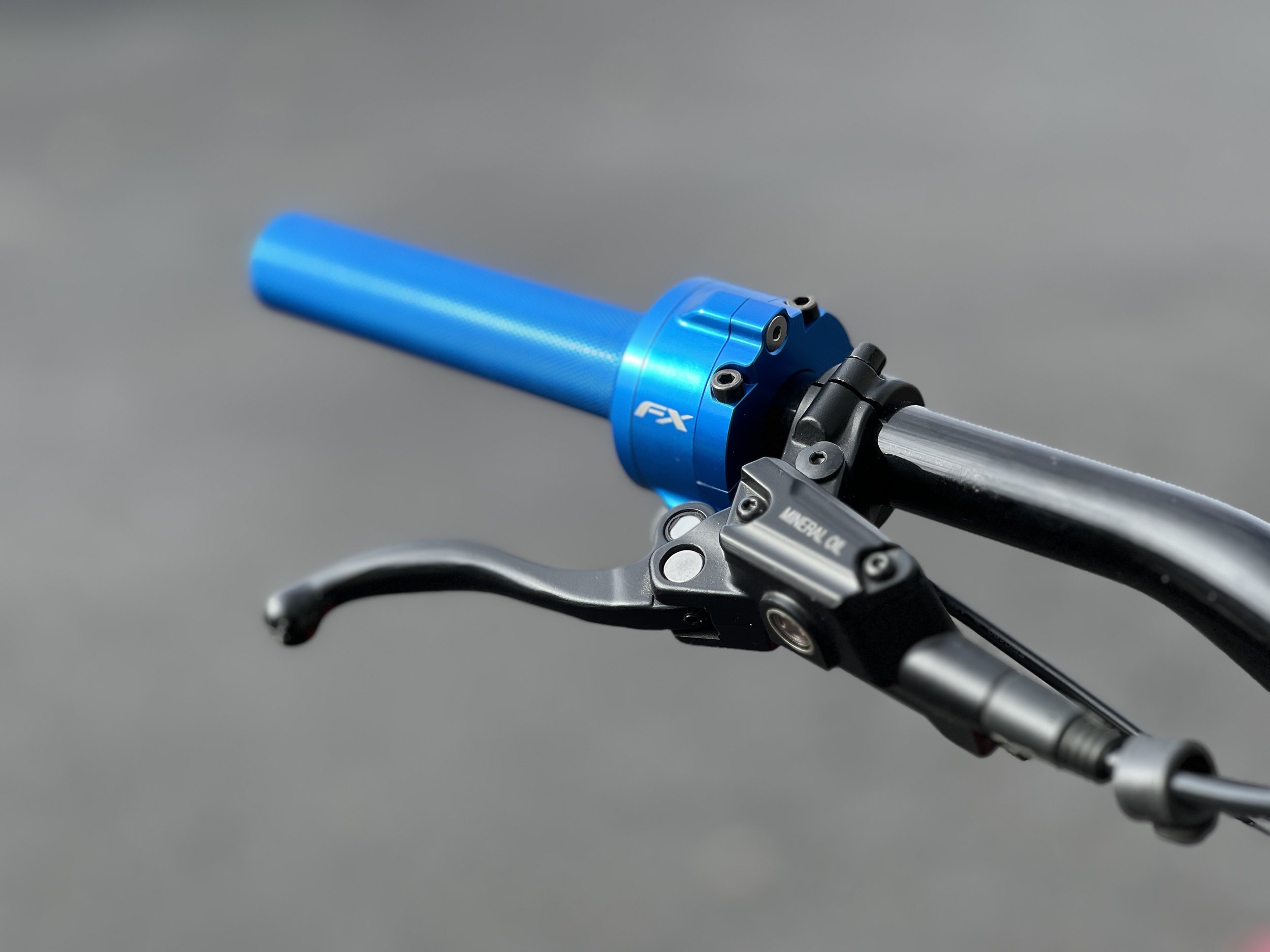 FX Twist Throttle installed in anodized blue