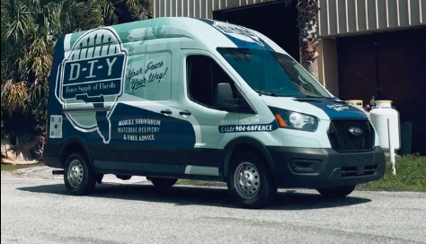 D-I-Y moving and furniture delivery van parked on the street outside a building Custom T-Shirts in Jacksonville & Expert Vehicle Wraps in Jacksonville, FL