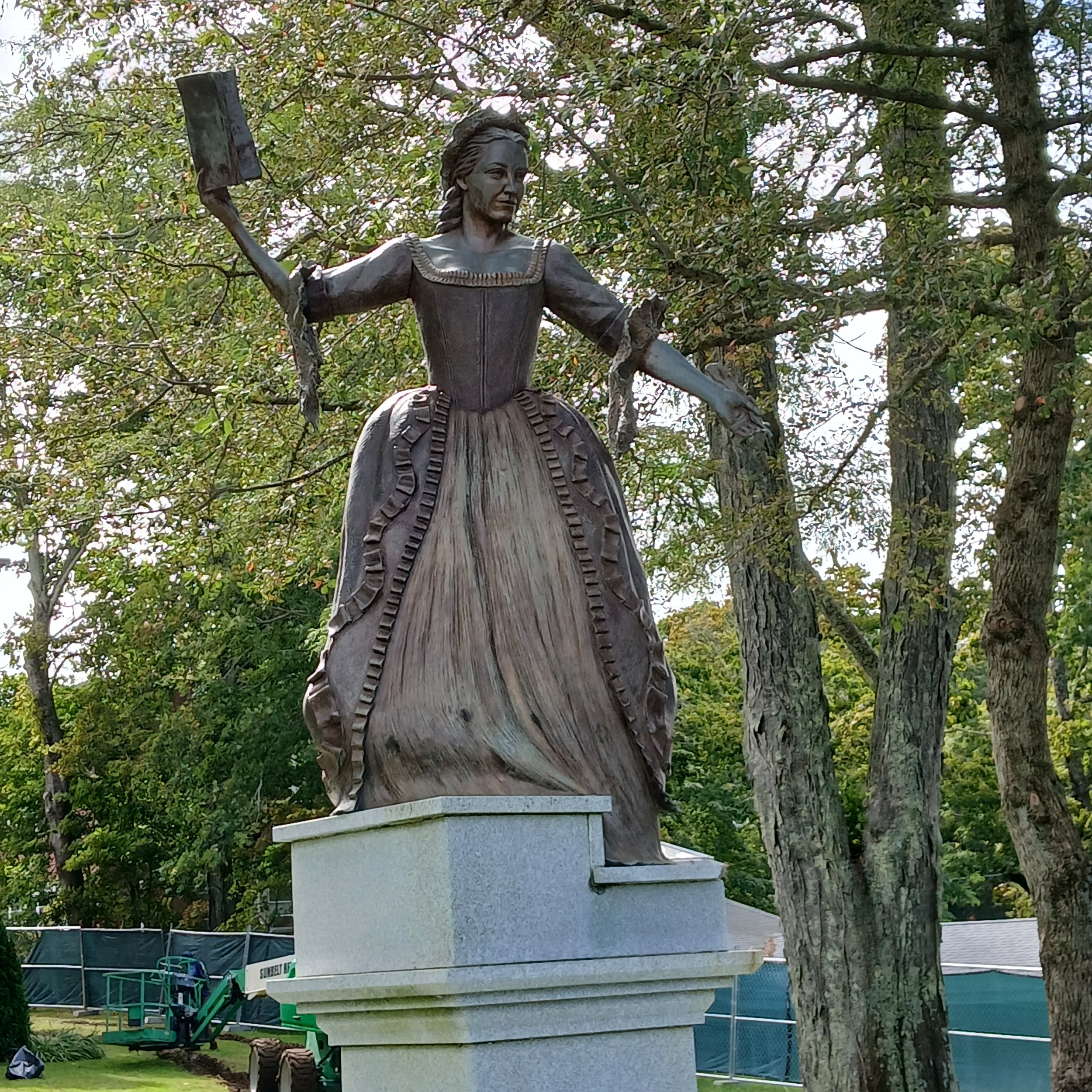 I have wanted to get to the statue of #MercyOtisWarren to see how they did her lace for a long time. With a friend the other day, we got to the Courthouse. But it's under construction and fenced off--so I had to grab a shot over the fence and couldn'