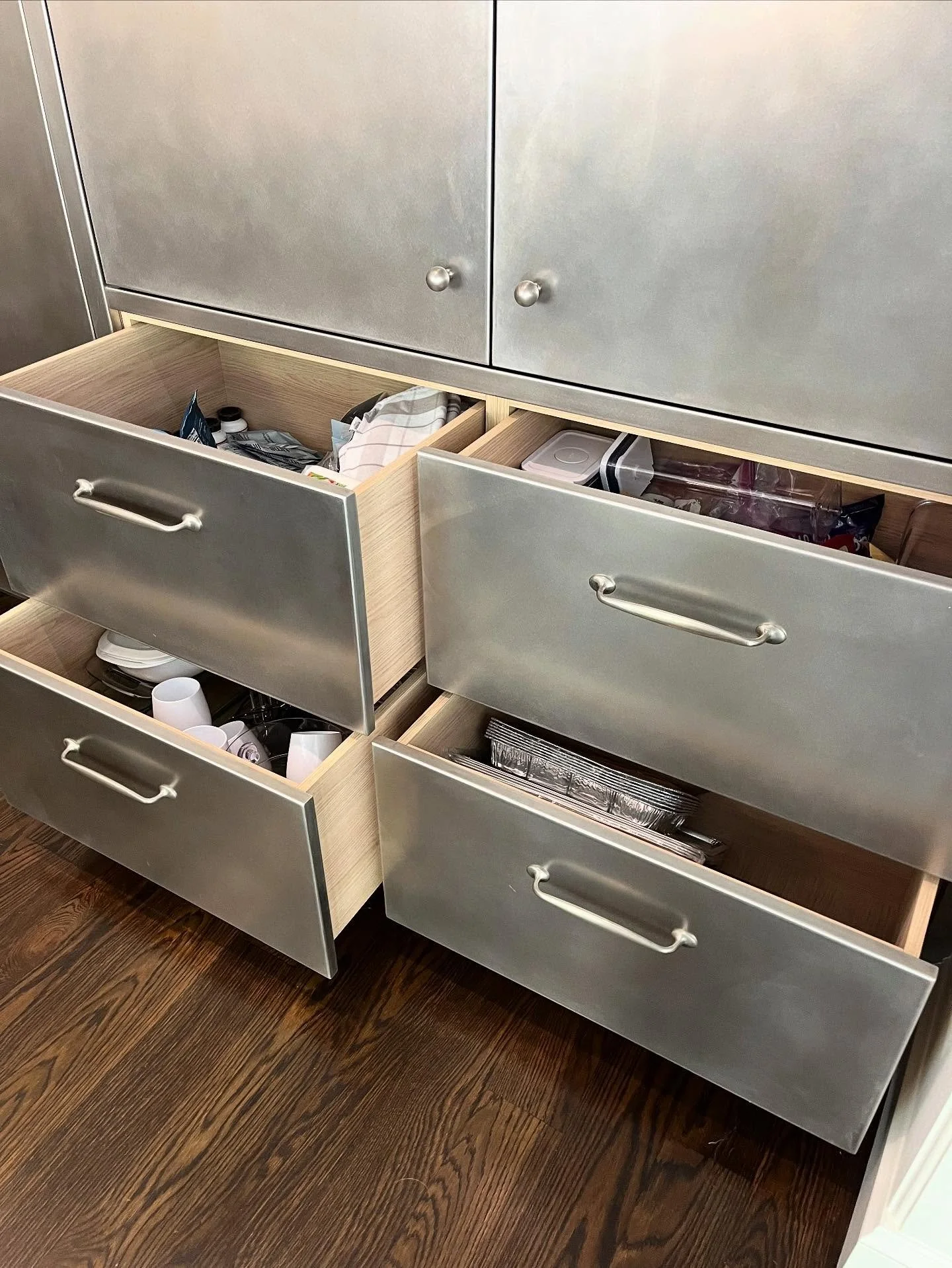 Stainless steel clad drawers on Vicenza Oak substrate &amp; @blum_usa MOVENTO slides for our recently completed Kutchen project designed by @leascheinstudio ✨