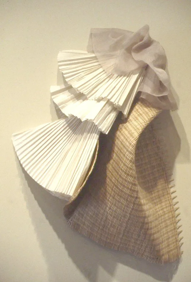 Birth of the Bustle, 1982, woven reed, paper, cloth, 44 x 33 x 16 "
