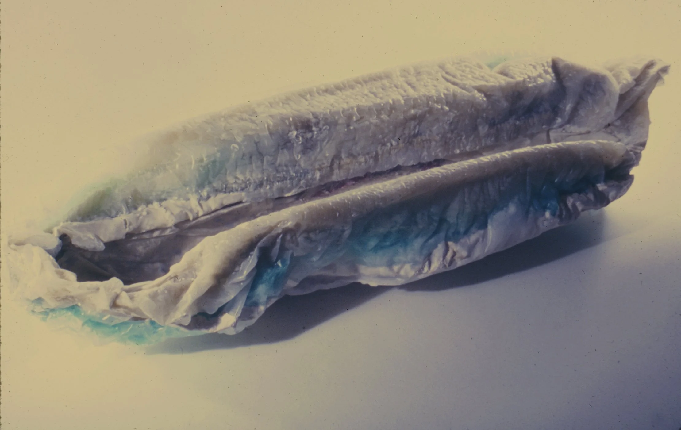Styx, 1986, wax, plaster, silk, 40 x 13 x 8 "