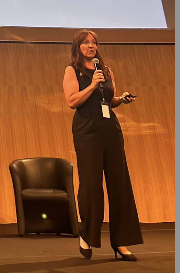 Amy McCae fractional wellness strategist keynote speaker at the Unicorn Summit in Lisbon Portugal.