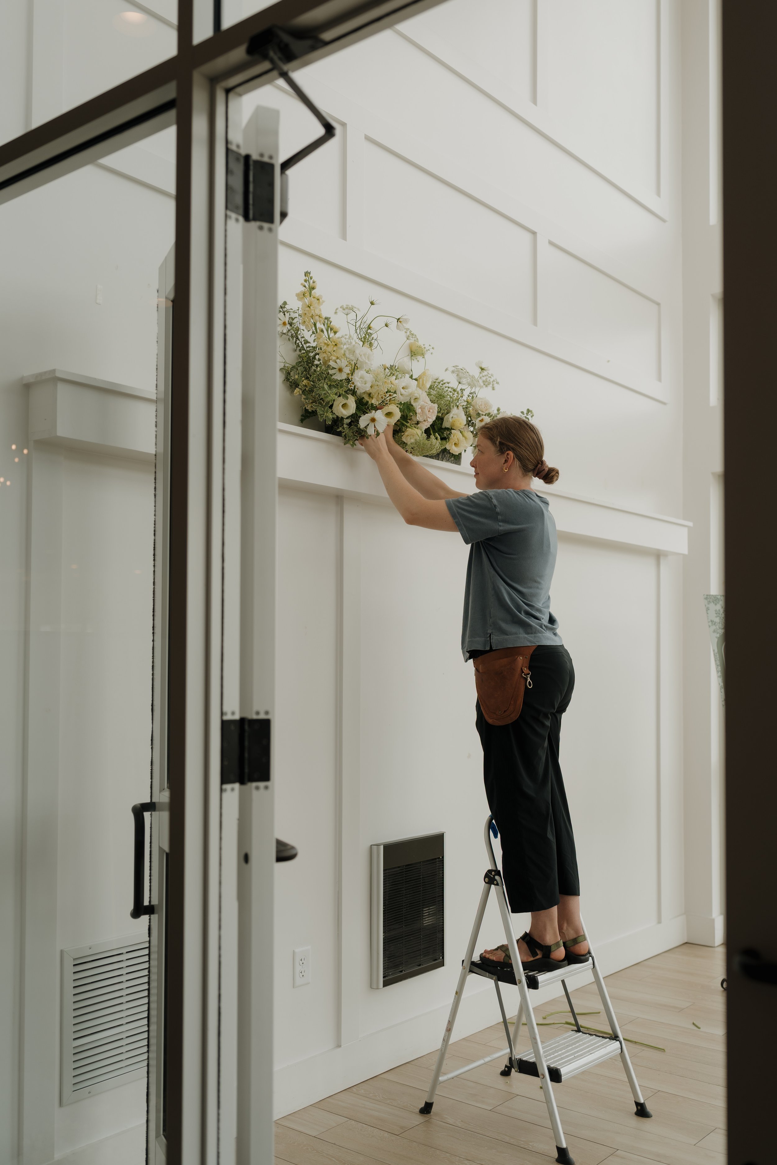 madeline working on wedding flowers