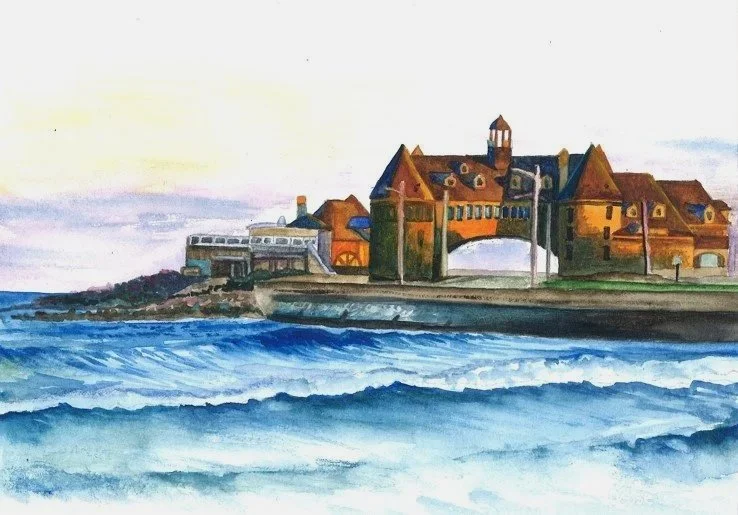 Watercolor painting of a seaside scene with waves in the foreground and a historic building complex with arches and towers on the shoreline.