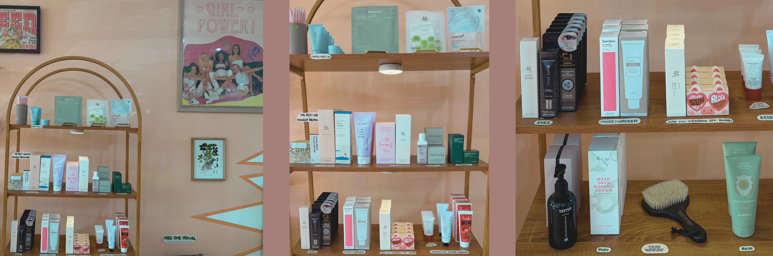 Various skincare and beauty products arranged on wooden shelves, including creams, serums, and lotions, with labels for different categories like eyes, moisturizer, body, and bath.