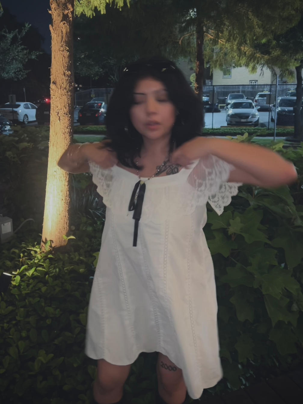 Taty in a white dress