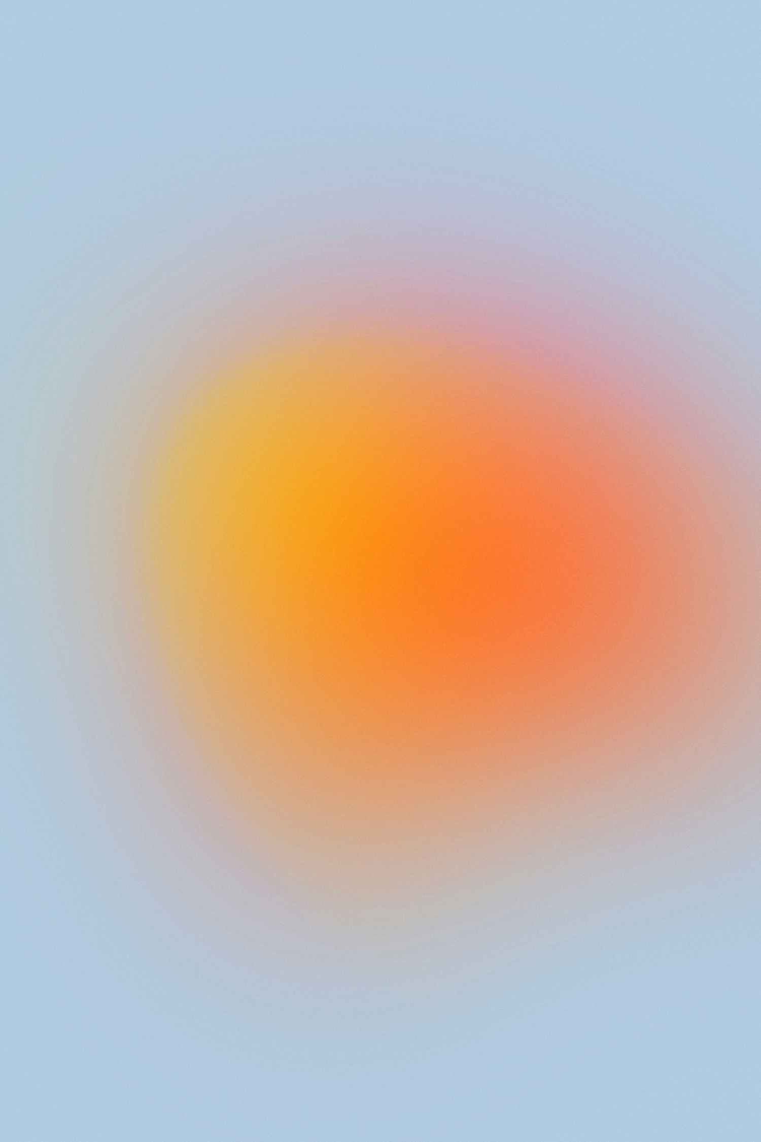 A yellow and orange sphere on grey background