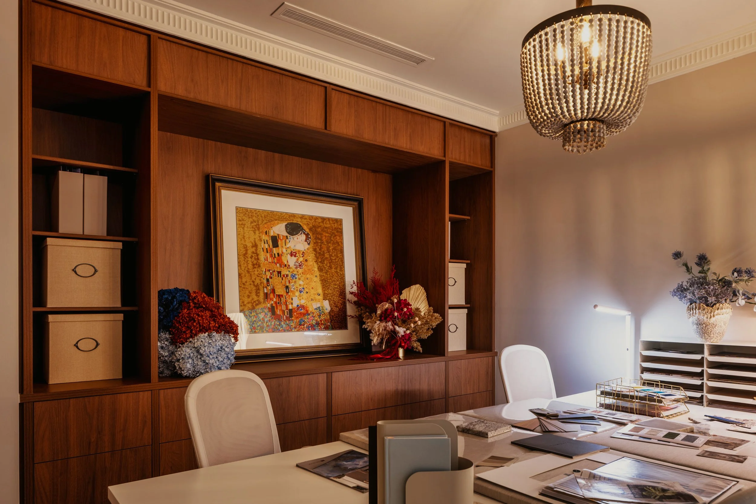 Styled home office after bedroom conversion — curated desk setup with artwork and shelving — bespoke interior styling Sydney — SYP Homes
