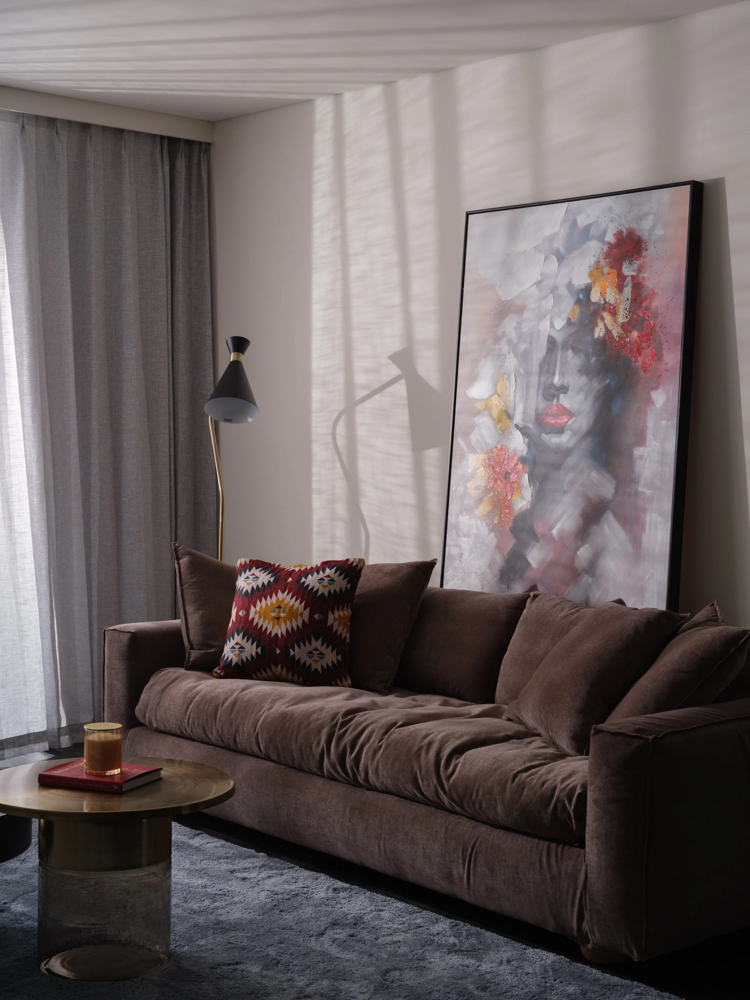 syp-homes-park-avenue-st-leonards-living-velvet-sofa-leaned-artwork-01.jpg