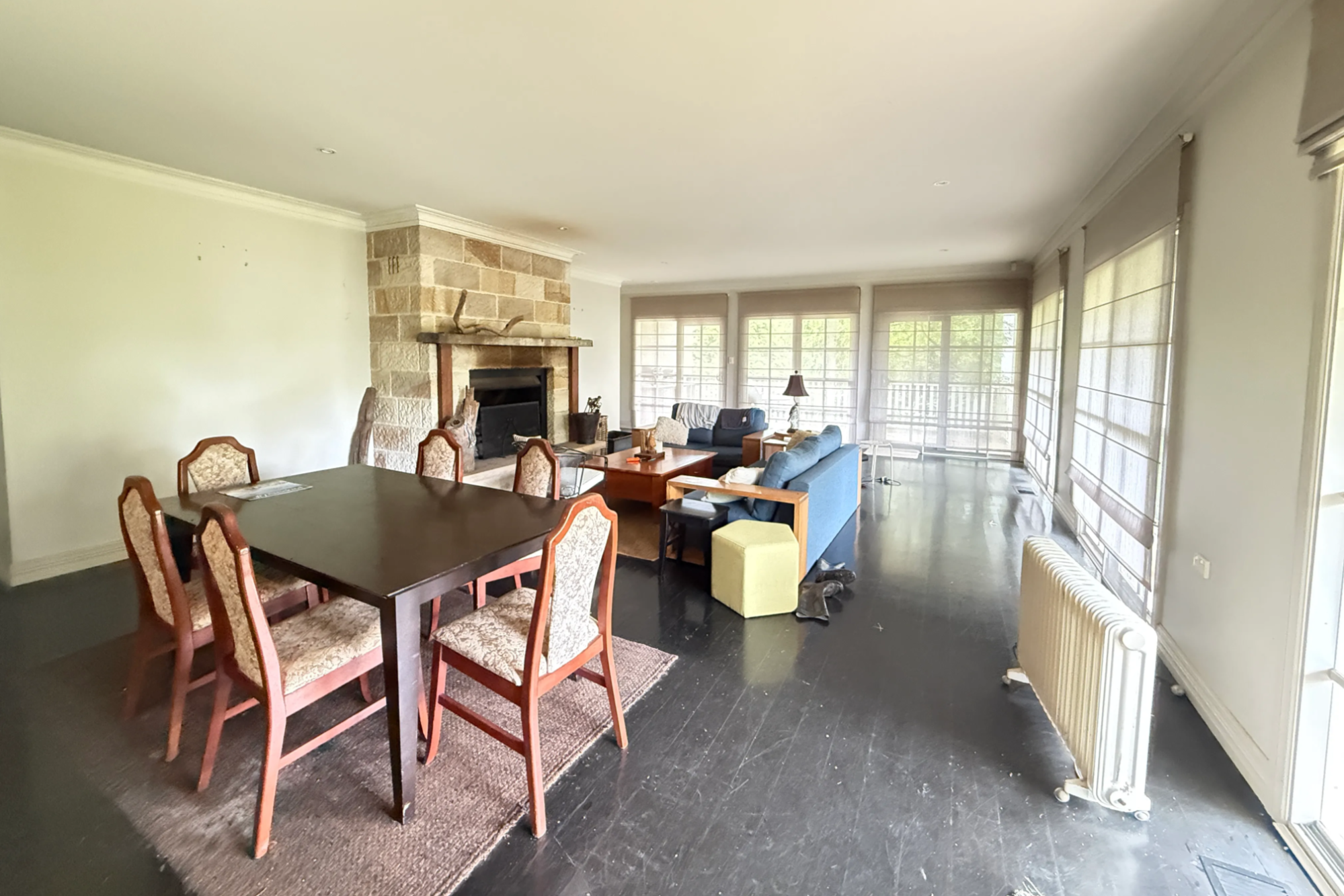 Living room before interior styling — mismatched furniture and unresolved composition — SYP Homes Sydney